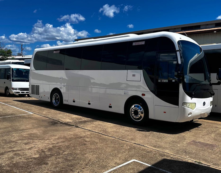 Bus facing forward, providing transport to delegates