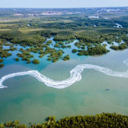 Ariel view of jet skis on waterway 
