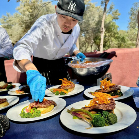 Chef preparing gourmet catering experience