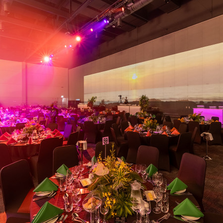 AIATSIS Gala event, flower arrangements in pinks and red