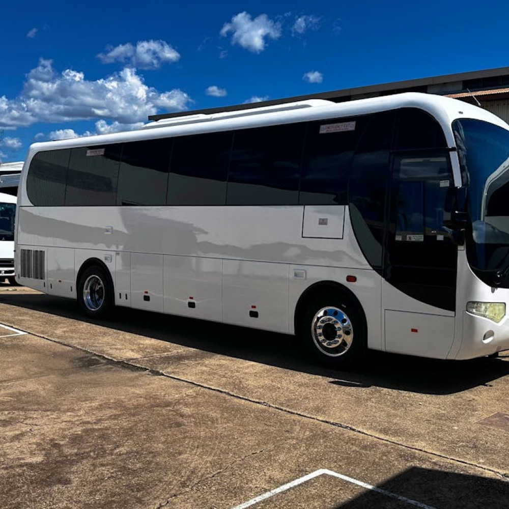 Bus facing forward, providing transport to delegates