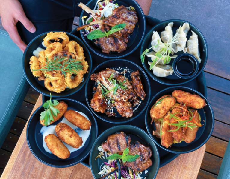Table with tapas at Epilogue Lounge