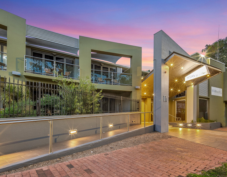 Stay at Alice Springs Hotel exterior at dusk
