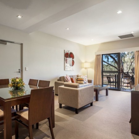 Loungeroom and kitchen at Quest Alice Springs