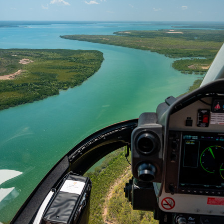 person sightseeing from helicopter