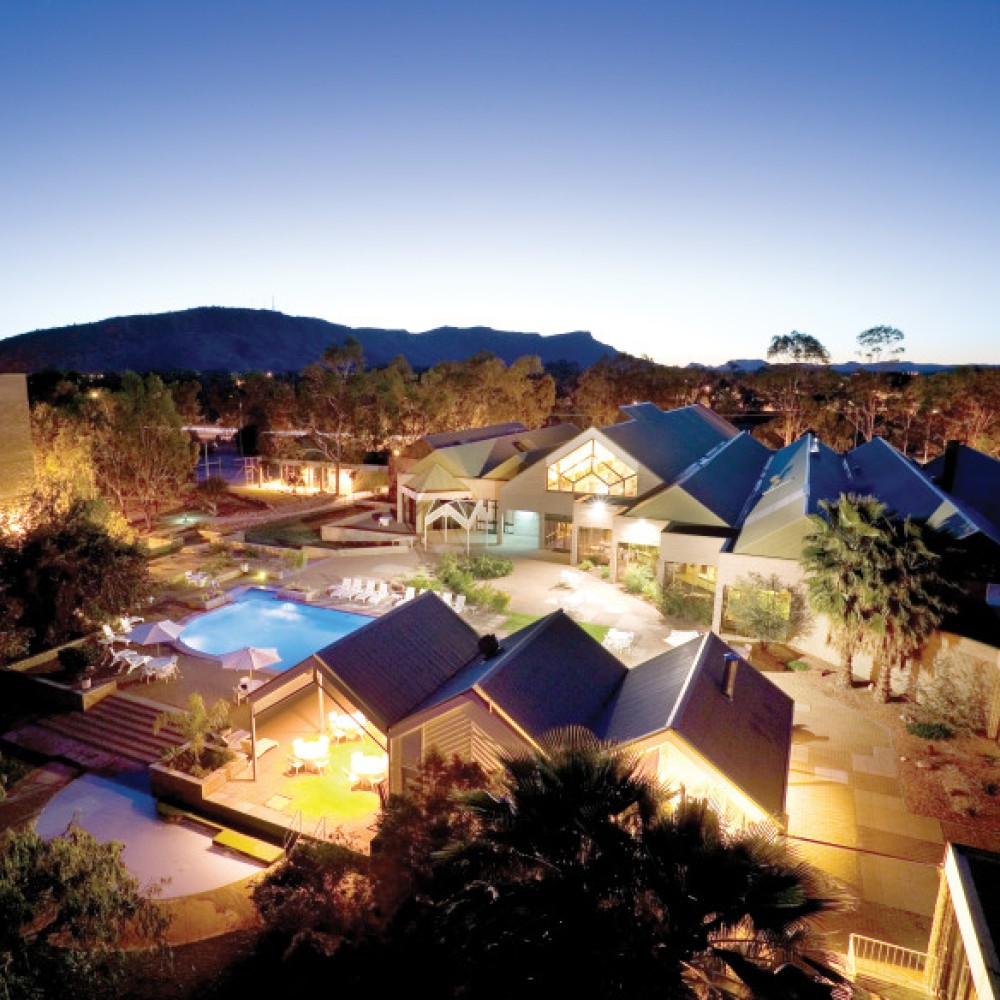 Ariel view of hotel at dusk
