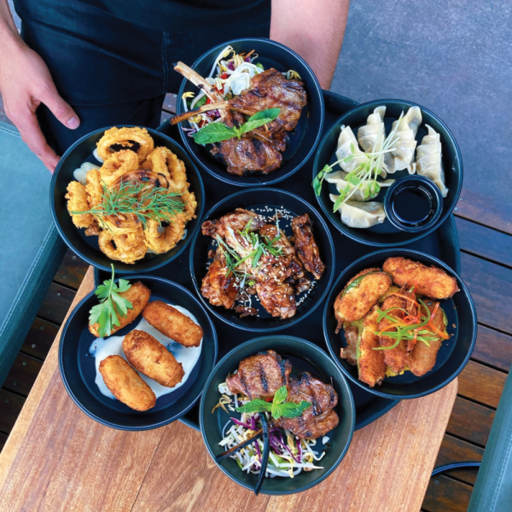 Table with tapas at Epilogue Lounge